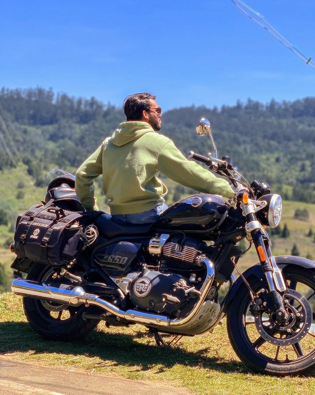 Harish on a motorcycle on a hill road